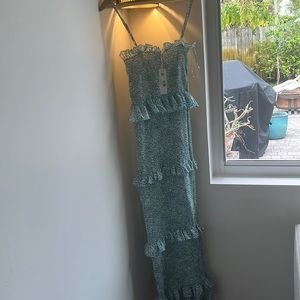 Long very fitted blue and white flowered dress